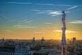 Sunset over city of Milan. Shades of orange, pink, and purple spread across the sky Royalty Free Stock Photo