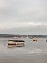 sunset over coast ocean bay water sky sea boats docks moored Royalty Free Stock Photo