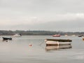 sunset over coast ocean bay water sky sea boats docks moored Royalty Free Stock Photo