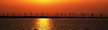 Sunset over coastal wind farm Royalty Free Stock Photo