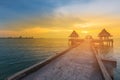 Sunset over coastline and walking way leading to seacoast skyline Royalty Free Stock Photo