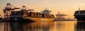 Sunset Over the Container Ship Harbor Royalty Free Stock Photo