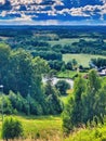 Sunset over countryside - aerial view. Mountain scenic view landscape photography. Landscape view with green field and blue sky. Royalty Free Stock Photo