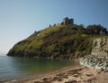 Sunset over Criccieth castle in North Wales in Gwynedde Royalty Free Stock Photo