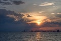 A sunset over the Dancing Cranes in the Port of Thessaloniki Royalty Free Stock Photo