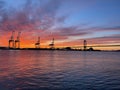 Sunset over Delaware River at Walt Whitman Bridge and Philadelphia Port Royalty Free Stock Photo