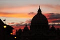 Sunset over the dome of Saint Peter`s Basilica in Vatican City i Royalty Free Stock Photo