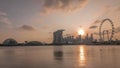 Sunset over the downtown skyline of Singapore as viewed from across the water from The Garden East timelapse. Singapore. Royalty Free Stock Photo