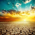 Sunset over drought earth