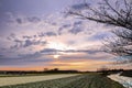 Sunset over a dutch flower field with hyacinths Royalty Free Stock Photo