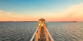 Dutch national park Lauwersmeer in Friesland with an ancient lighthouse in front Royalty Free Stock Photo