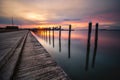 Sunset over an empty fishing pier and boat basin. Long Island New York. Royalty Free Stock Photo