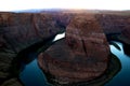 Sunset over famous Horseshoe Bend Utah and Arizona. The beautiful Colorado river carved this horseshoe shaped sandstone reflecting