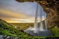 Sunset over the famous Seljalandsfoss Waterfall in Iceland
