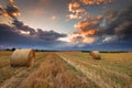 Sunset over farm field. Royalty Free Stock Photo