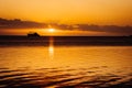 Sunset over fishing boats and commercial tankers, Tombeau Bay, Mauritius Royalty Free Stock Photo