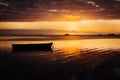 Sunset over fishing boats and commercial tankers, Tombeau Bay, Mauritius Royalty Free Stock Photo