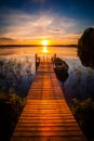 Sunset over the fishing pier at the lake in Finland Royalty Free Stock Photo