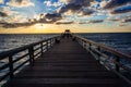 Sunset over the fishing pier in Naples, Florida. Royalty Free Stock Photo