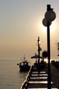 Sunset over fishing village in greece Royalty Free Stock Photo