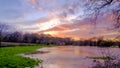 Sunset over the flooded fields near the Mill at South Boarhunt, Hampshire Royalty Free Stock Photo