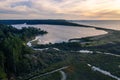 Sunset over Floras Lake and ocean Royalty Free Stock Photo