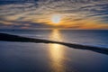 Sunset over Floras Lake and ocean