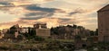 Sunset over the Fori Imperiali ruins, the ancient roman market and forum, Rome, Italy Royalty Free Stock Photo