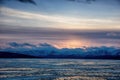 Sunset over frozen lake. Winter landscape of Mongolia. Royalty Free Stock Photo