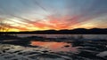 Sunset over Frozen Pontoosuc Lake at Pittsfield, MA.