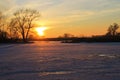 Sunset over the frozen river Dnieper Royalty Free Stock Photo
