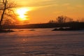 Sunset over the frozen river Dnieper Royalty Free Stock Photo