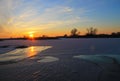 Sunset over the frozen river Dnieper Royalty Free Stock Photo