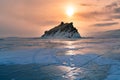 Sunset over frozen water lake Baikal Russia winter season Royalty Free Stock Photo