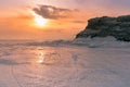 Sunset over frozen water lake Siberia Baikal Russia Royalty Free Stock Photo