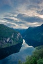 Sunset over the Geirangerfjord and the Seven Sisters Waterfall,  Norway Royalty Free Stock Photo