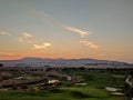 Sunset over golf course Royalty Free Stock Photo