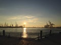 Sunset over a harbour and docks Royalty Free Stock Photo