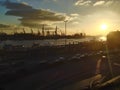 Sunset over a harbour and docks Royalty Free Stock Photo