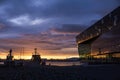 Sunset over Harpa concert hall and the harbor of Reykjavik, Iceland Royalty Free Stock Photo