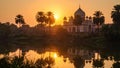 Sunset over a historic mausoleum with palm trees and reflection on water Royalty Free Stock Photo