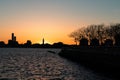 Sunset over the Hoboken New Jersey Skyline along the Hudson River seen from the Riverfront of New York City Royalty Free Stock Photo