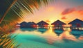 sunset over holiday paradise sea with bungalows