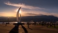 Sunset over the iconic fiberglass sculpture `Spirit of Sail` at the City Park of Kelowna
