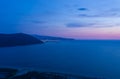 Sunset over Ionian Sea, twilight on wild beach near island of Lefkada Royalty Free Stock Photo