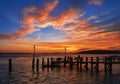 Sunset over the jetty at Sandbanks in Dorset