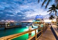 Sunset over Key West, Florida. Wooden bridge at the port Royalty Free Stock Photo