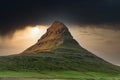 Sunset over the Kirkjufellsfoss Waterfall with Kirkjufell Mountain Royalty Free Stock Photo