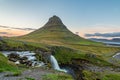 Sunset over the Kirkjufellsfoss Waterfall with Kirkjufell Mountain Royalty Free Stock Photo