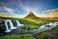 Sunset over Kirkjufellsfoss Waterfall and Kirkjufell mountain in